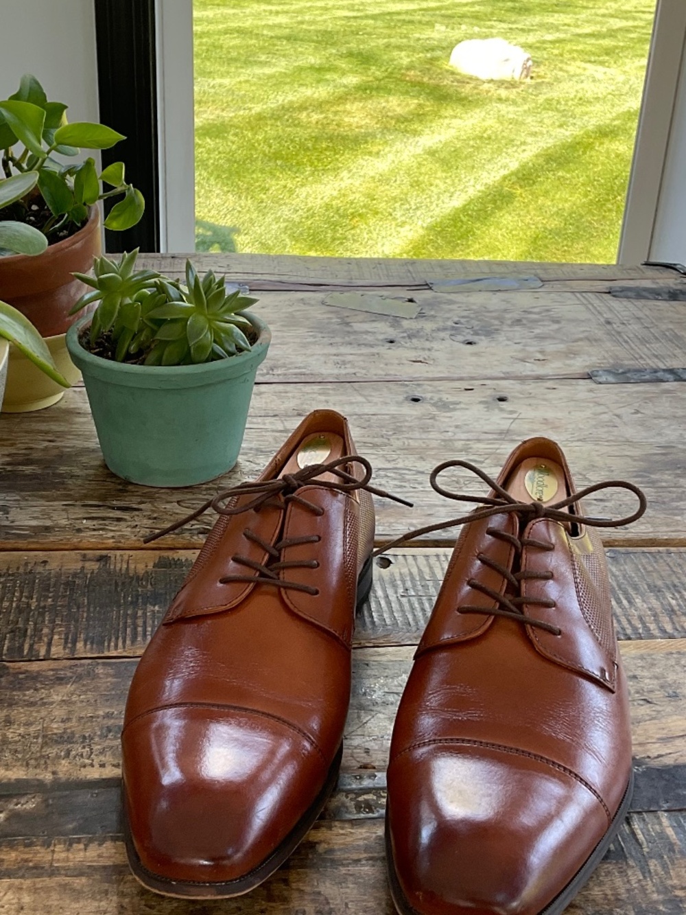 Florsheim men’s tan shoe,12 D.